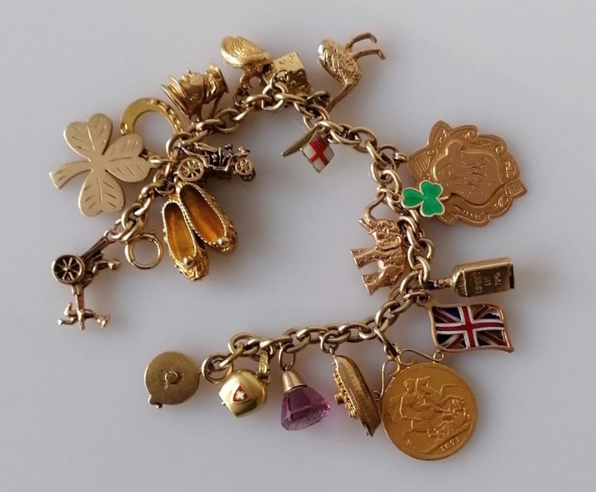 A 9ct yellow gold charm bracelet, all hallmarked, to include a Victorian gold full sovereign, 1871, - Bild 2 aus 2