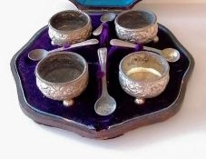 A Victorian cased set of four silver salts with conforming spoons by William Evans, London, 1879