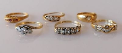 A selection of six gold and diamond rings, mostly early 20th century, some with platinum, one with r