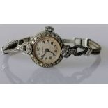 An Art Deco ladies platinum-cased diamond-set manual cocktail watch on a later 9ct white gold bracel