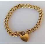 A gold curb-link locket bracelet, 16 cm, hallmarked 9ct, 22.45g