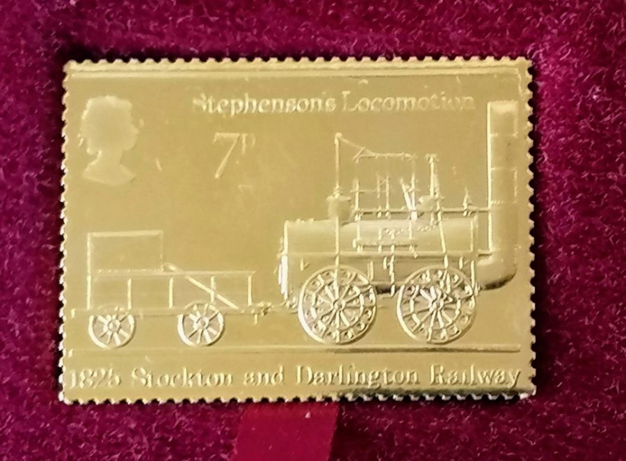 A cased 22ct gold replica of 'The Locomotion' postage stamp, 1975 with CoA no. 1589 and original pac - Image 2 of 2