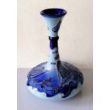 A Moorcroft Ship pattern squat vase, tube lined on a graded blue ground, impressed marks and painted