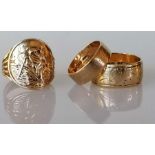 A gold St. Christopher ring and two gold wedding bands with etched decoration, sizes P, N, Q