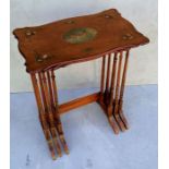 An Edwardian satinwood nest of three tables with painted decoration to tops and legs, 68 h x 56 w x