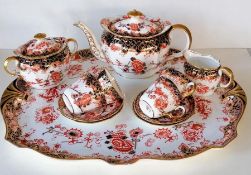An Edwardian Royal Crown Derby tea service, pattern 2649 comprising four cup/saucers/plates, cove