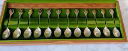 A cased limited edition boxed set of twelve silver flower spoons commissioned by The Royal Horticult