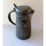 A Liberty & Co Tudric pewter flagon, circa 1900, with hinged lid and handle and stylized impressed d