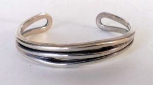 A Tiffany & Co. silver bangle, stamped .925, Italy