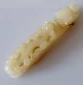 A 19th century Chinese white jade belt buckle hook with carved dragon head and chilong surmount to s