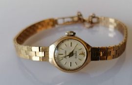 A mid-century ladies Accurist dress watch with 9ct gold case and bracelet strap, hallmarked, catch f