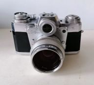 A Zeiss Ikon Contarex Bullseye SLR Camera in chrome with extra lenses, accessories, see extra photos