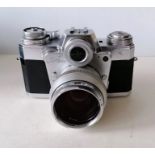 A Zeiss Ikon Contarex Bullseye SLR Camera in chrome with extra lenses, accessories, see extra photos