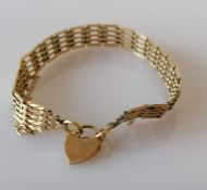 A 9ct yellow gold gate-link bracelet with padlock, hallmarked, 14g