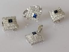 A diamond and sapphire parure on 18ct white gold featuring a square cluster ring with 28 round brill