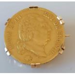 A Louis XVIII (1814-1824) 40 Francs mounted gold coin, dated 1818-W (Lille), 16.16g