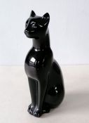 A Baccarat coloured glass study of a seated black cat, etched label, 16 cm H, without visible damage