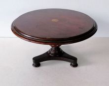 A 19th century miniature or apprentice piece mahogany circular flip-top table with shaped top, inlai