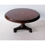 A 19th century miniature or apprentice piece mahogany circular flip-top table with shaped top, inlai