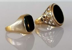 Two gold signet rings with onyx decoration, one with pierced shank, both hallmarked 9ct gold, sizes