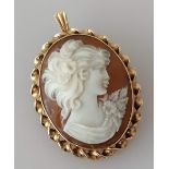 A 9ct gold-framed cameo brooch, 35mm x 28mm, hallmarked, 8.2g