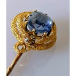 A late Victorian sapphire serpent stick pin, set with a cushion-cut sapphire, approximately 9.94 x