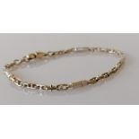 A fancy-link white gold bracelet, 19.5 cm, hallmarked 9ct, 8.75g