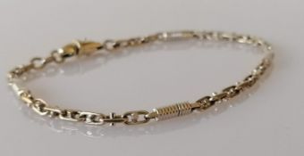 A fancy-link white gold bracelet, 19.5 cm, hallmarked 9ct, 8.75g