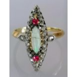 An French Belle Epoque opal and diamond ring in a white and yellow metal basket setting, size O, the