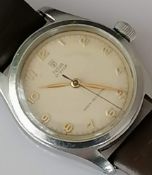 A vintage Tudor Oyster gent's watch with Arabic gold numerals and hands, small rose motif, case