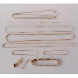 An assortment of 14ct yellow gold neck chains x 5, bracelets x 3 and pendants x 4, mostly Italian,