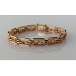 A rose gold fancy-link bracelet with box clasp, safety chain, stamped 9ct, 19 cm, 18.7g