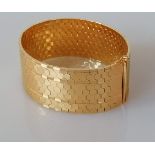 An Italian 18ct yellow gold honeycomb cuff bracelet, stamped 750, 19.5 cm, 56g