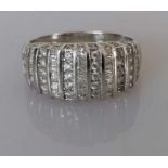 A vintage white gold and cubic zirconia dress ring in a pave setting, size O, hallmarked for Elini 7