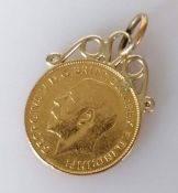 A mounted George V gold half sovereign, 1912, 4.64g
