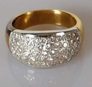 A yellow gold convex diamond dress ring decorated with forty-seven round brilliant diamonds