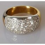 A yellow gold convex diamond dress ring decorated with forty-seven round brilliant diamonds