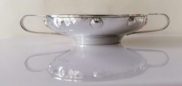 An Arts & Crafts silver twin handled bowl with planished and embossed detail by Albert Edward Jones