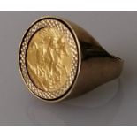 An Edwardian gold half-sovereign ring on a hallmarked 9ct yellow gold shank, 1902, size X, 12g