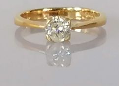 A single-stone diamond ring, the round brilliant-cut diamond, weighing an estimated 0.44 carat,