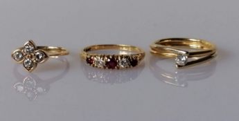 Three gem-set diamond rings set in 18ct yellow gold