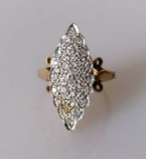 A marquise-set diamond panel ring on an 18ct yellow gold setting