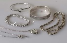 Two silver bangles, one bracelet, two pendant chains, a necklace and a Victorian silver-handled butt