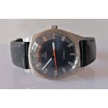 A men's 1960s Omega Geneve wristwatch with black dial, orange seconds hand