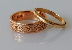 A rose gold band with celtic-knot design and a yellow gold wedding band, sizes N, M, both stamped 14