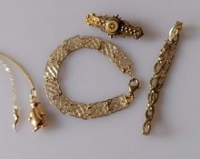 A 9ct yellow gold filigree panel-link bracelet, stamped for ZED; another gold fancy-link bracelet,