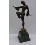 An Art Deco bronze figure of lady in a dance post on a green marble base, signed Barye, 50 cm H