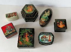A Palekh Russian lacquered box depicting The Frog Princess; a Fedoskino box of the Maslnitsa Festiva