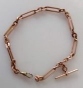 A 9ct rose gold fancy-link Albert chain with T-bar and single clasp (in yellow gold), 30 cm, hallmar