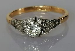 A single stone diamond ring consisting of an early brilliant-cut diamond, weighing approx. 0.26 cara